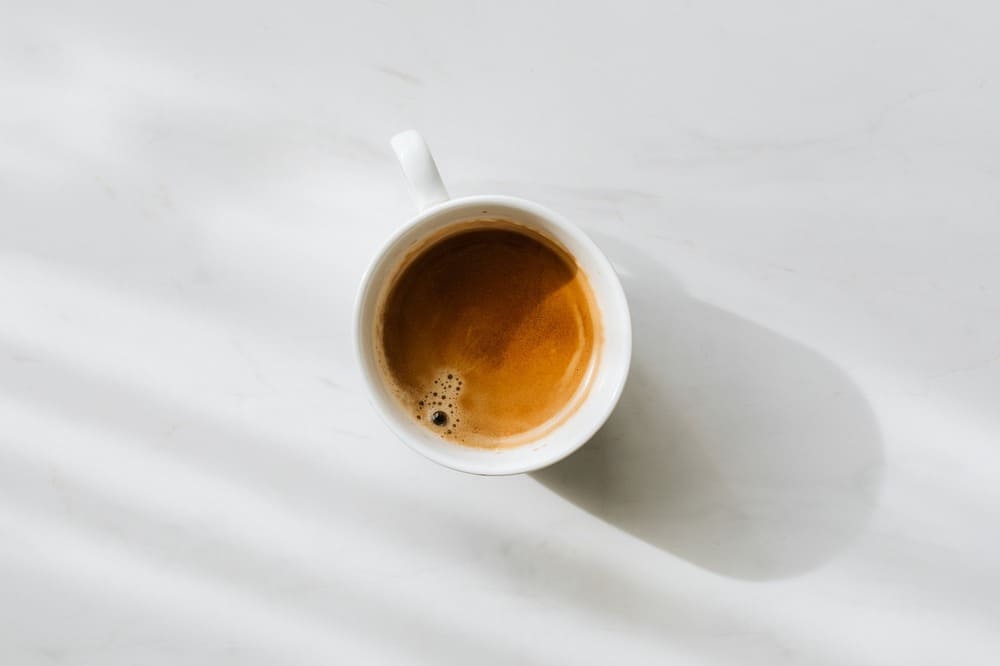 Photo-of-a-cup-full-of-coffee being-viewed-from-above