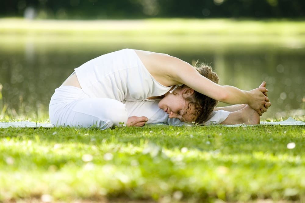 Why-Taking-Better-Care-of-Yourself-is-Important-woman-practicing-yoga