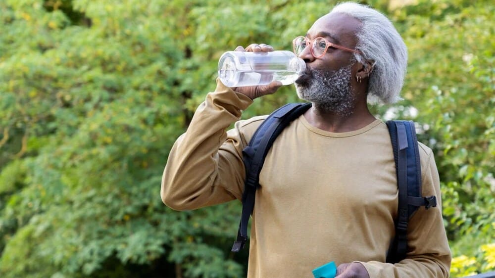 older-male-drinking-water