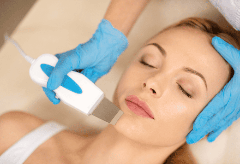 woman-using-device-that-helps-with-skin-treatment